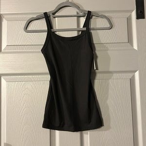 Black tank top with tags on
